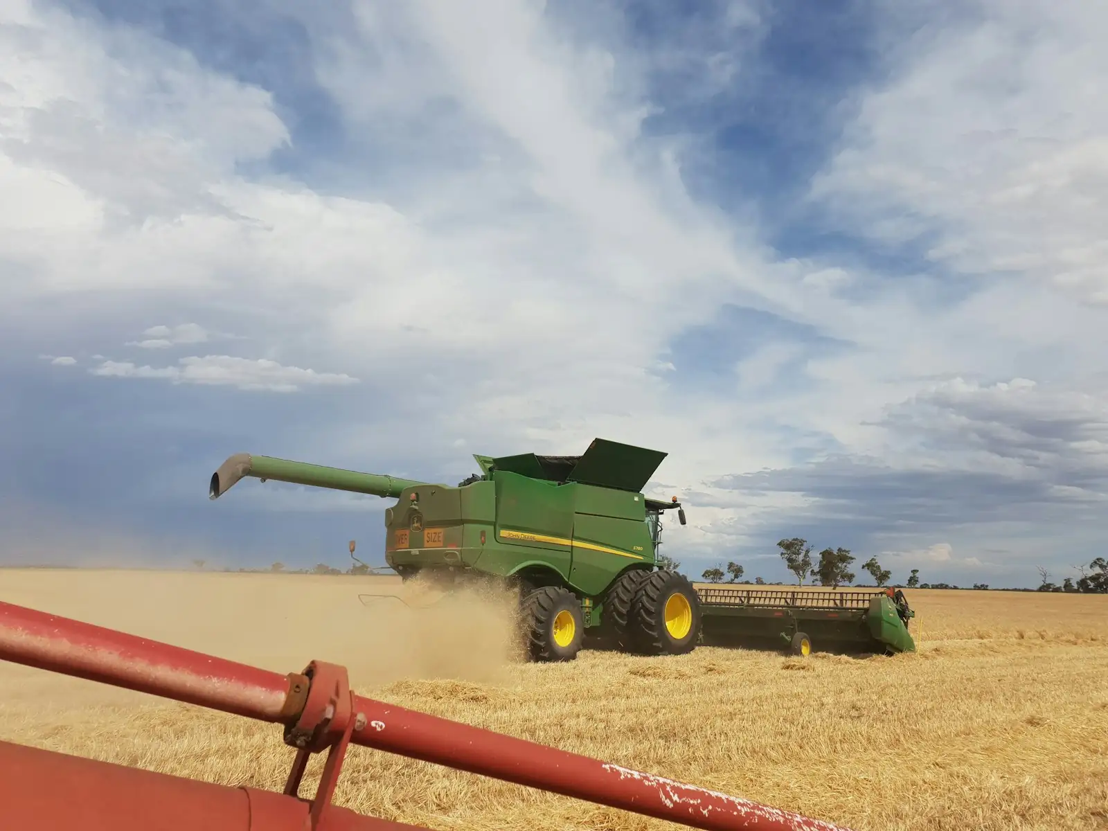 Combine harvester working a wheat paddock