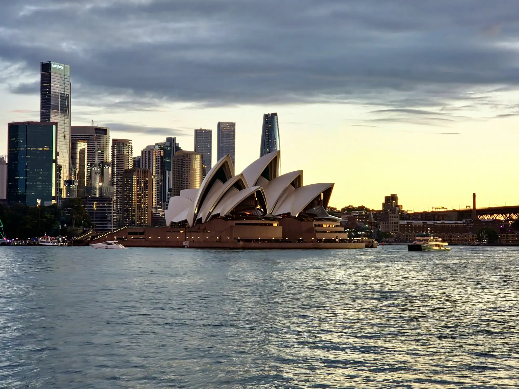 Sydney Opera House and city skyline at sunset