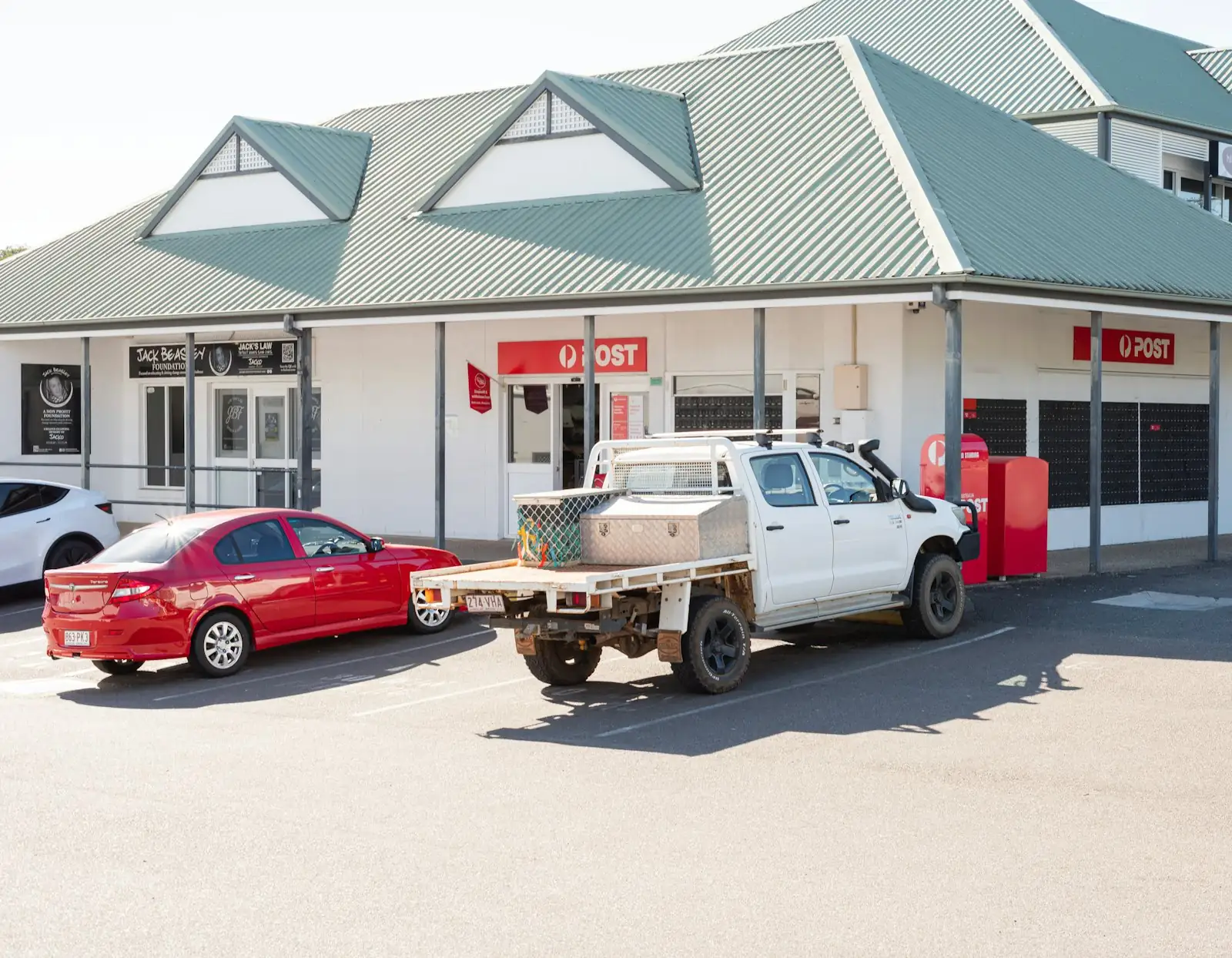 Tray-back ute at a country service station